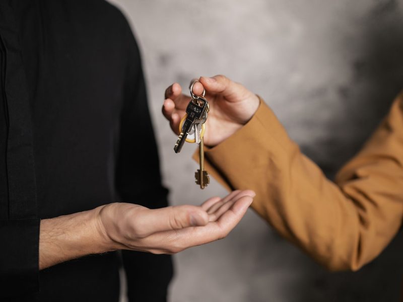 House keys being handed over to a new home owner