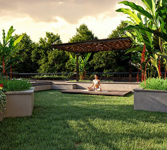 Yoga deck with pergola on the landscaped lawn